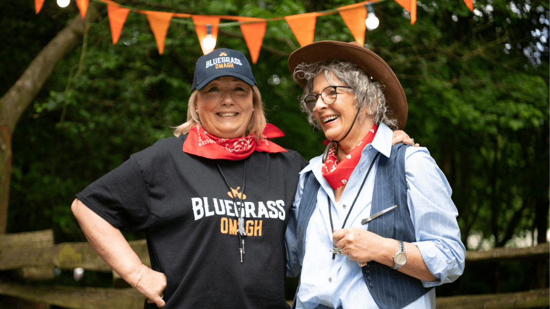 two women volunteering at bluegrass omagh 2023 