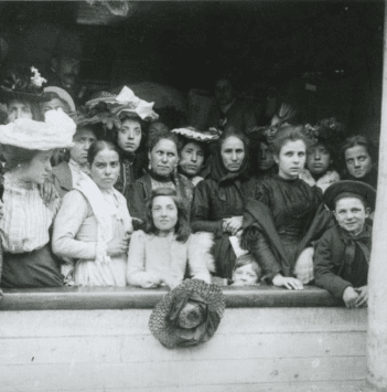Group of women on a boat from Ireland to America, black and white.